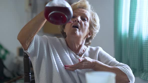 Funny and Stylish Senior Lady Drinking with Bottle of Wine