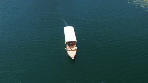 Motor Boat Floats on a Crnojevica River, Aerial