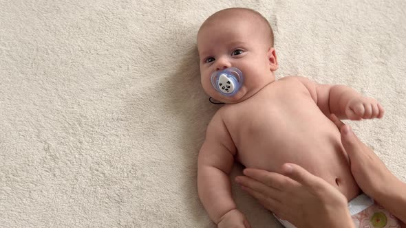 Health Skin Care Development Pediatrics Infant Closeup Mother Hands Give Naked Newborn Baby Child alt