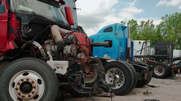 Many Old Broken Truck in a Scrap Yard Near the City alt