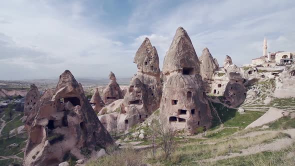 View of Cave Houses in Rock Formation at Ortahisar. Cappadocia. Nevsehir Province. Turkey