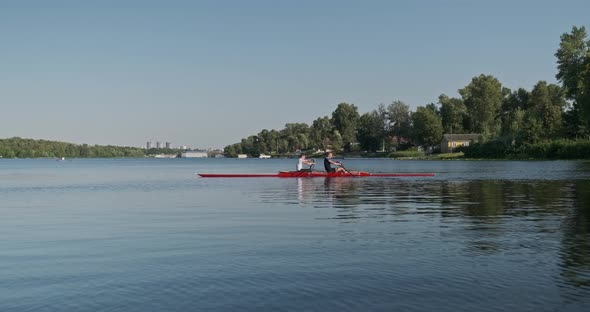 Young Sports Team Two Teenage Boys with Double Boat Kayak alt