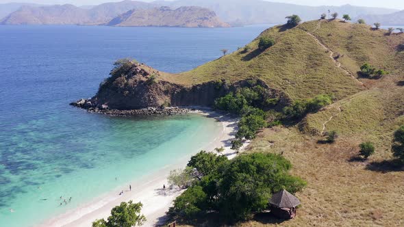 Aerial view of Pink Beach and Coral lined waters of Komodo National Park, Flores, Indonesia. alt