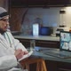 Arabic Doctor Making Zoom Video Conference with Doctors From Other Countries on Coronavirus Disease - VideoHive Item for Sale