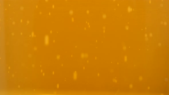 Fresh tasty beer bubbles and foam in glass 4K 3840X2160 UltraHD footage - Glass of beer and bubbles  alt