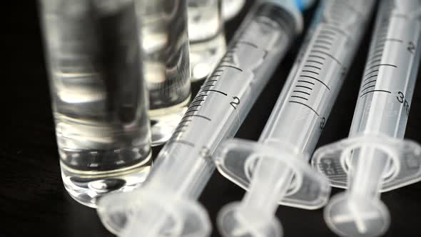 Medical Syringes and Medical Ampoules for Vaccination on the Table alt