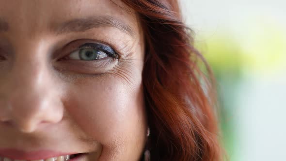 Beautiful Curly Haired Caucasian Girl Looking at the Camera and Smiling alt