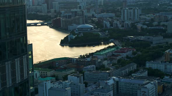 Aerial View of a Modern City at Sunset alt
