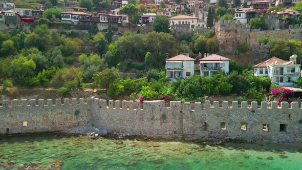 The Walls of the Historical Part of the City of Alanya on the Seashore alt