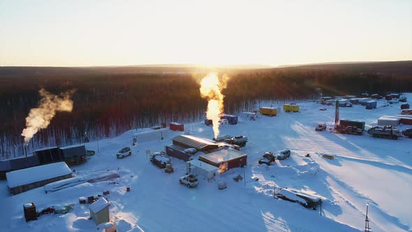 Top View of Smoke From Pipes of Oil Factory on Winter Day