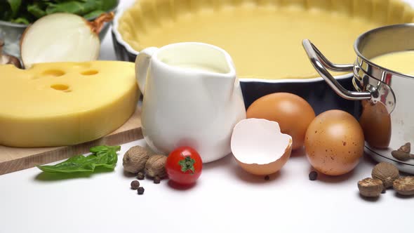 Shortbread Dough for Baking Quiche Tart in Baking Form and Ingredients alt