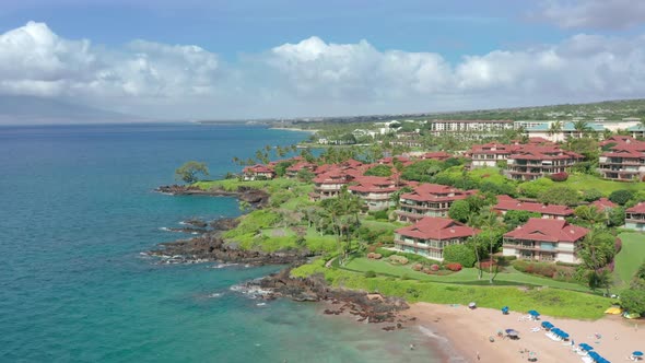 People Living in Luxury Beachfront Villas on Hawaii Maui Island Background alt
