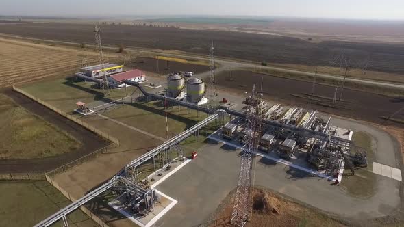 Aerial View of Transporting Station of Petroleum Plant with Flare Stack in Field