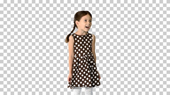 Cute little girl in polka dot dress talking, Alpha Channel alt