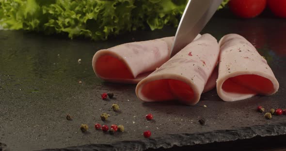 Meat Slicing. Thin Slices Of Sausage. alt