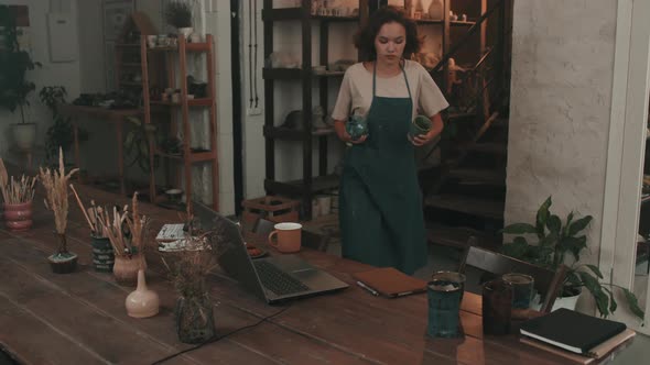 Woman Uploading Handmade Ceramics Online alt