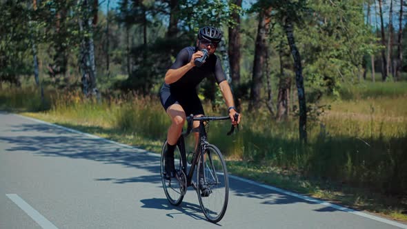 Cyclist Bike Cycling Triathlon Bike Bicycle Riding Pedaling.Triathlete Cyclist Training On Bicycle. alt