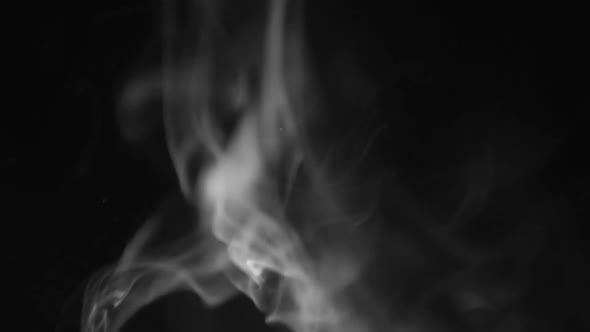 Gray Smoke on Black Background in Slow Motion