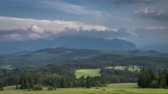 Clouds moving over Tatra Mountains at sunset, Poland, timelapse, 4K alt