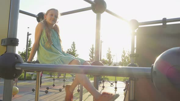 Child Girl Swinging The Legs 3 alt