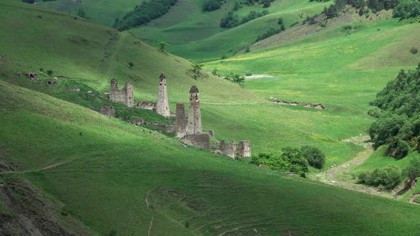 Medieval Tower Complex in Mountains alt