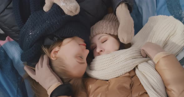 Two lesbians are resting outdoor Two lesbians are hugging outdoor LGBT Lesbian Bisexual Transgender alt