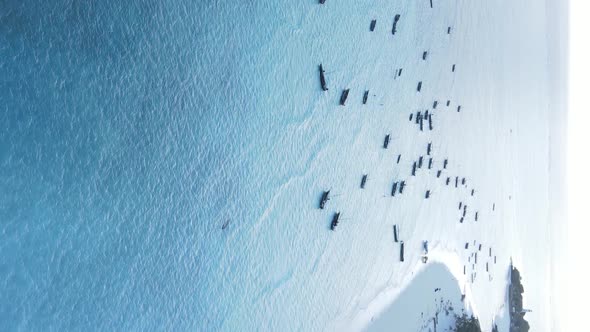 Tanzania Vertical Video  Boat Boats in the Ocean Near the Coast of Zanzibar Aerial View alt
