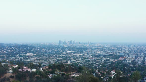 Urban aerial view of beautiful and scenic downtown Los Angeles on blue sky. alt