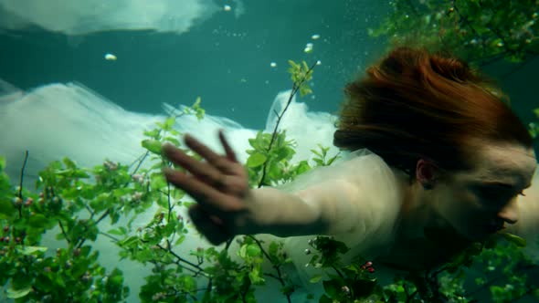 Romantic Dream and Fantasy About Swimming in Ocean Depth Pretty Lady is Floating Underwater alt