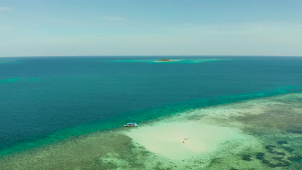 Sandy Beach on a Coral Reef alt