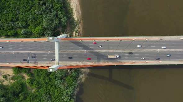 Aerial bridge landscape. Aerial road bridge. Highway road above river alt