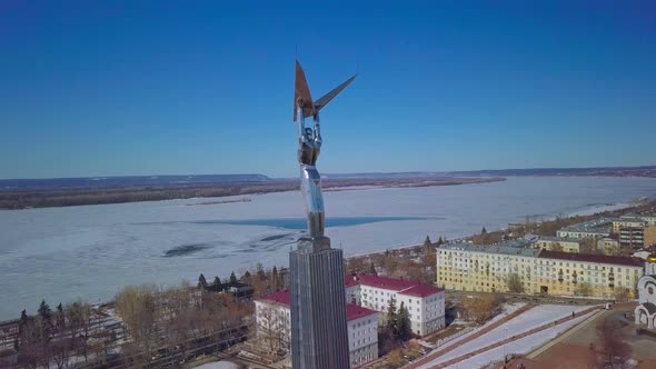 Drone Flying Around Monument of Glory in Samara City Steel Statue of Man