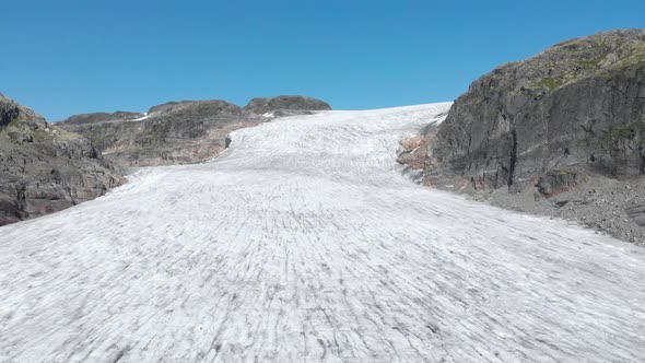 Aerial: beautiful glacier ice sheet, frozen Hardanger glacier alpine landscape alt