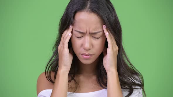 Young Stressed Multiethnic Woman Having Headache