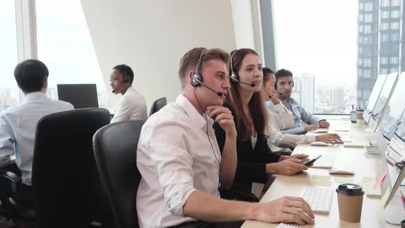 Group of business people telemarketing team working together in call center office