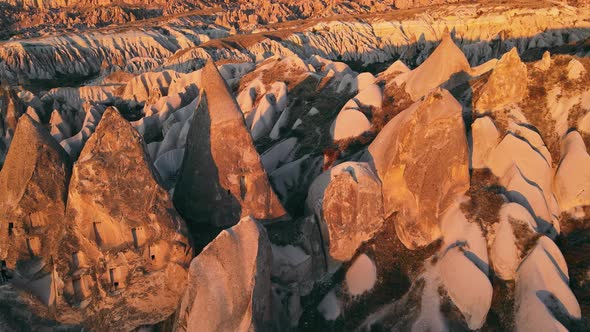 Cappadocia aerial drone view to Red and Rose valley rocks, Turkey alt