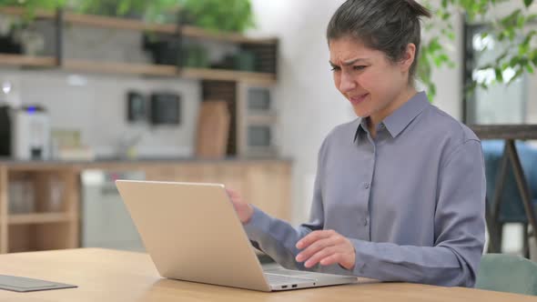 Young Indian Woman Feeling Frustrated While Using Laptop alt