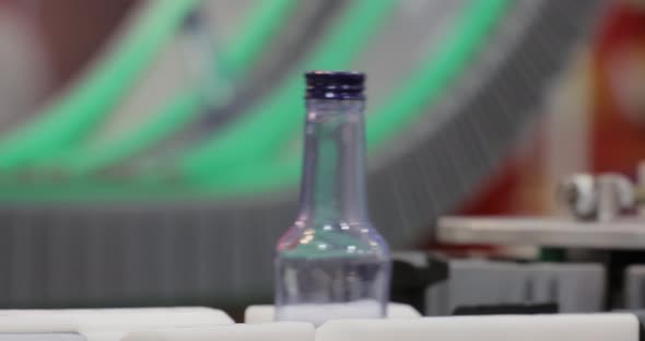 Bottles on Production Line Plant or Factory alt