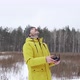 Man launching drone on snowy winter day - VideoHive Item for Sale