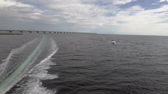 Motorboats On The Water Brigde