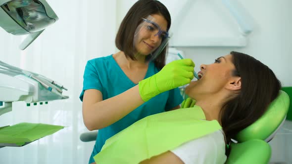 Professional Dentist Checking Patient Teeth, Qualified Help, Regular Checkup alt