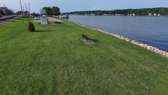 A drone drop down on a park bench overlooking the mighty Mississippi river. alt