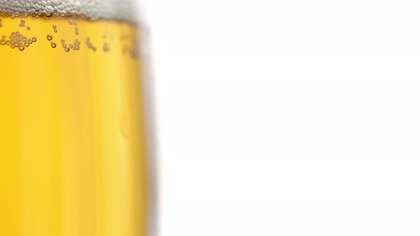 Glass With Beer And Bubbles, Foam In A Glass, White Background