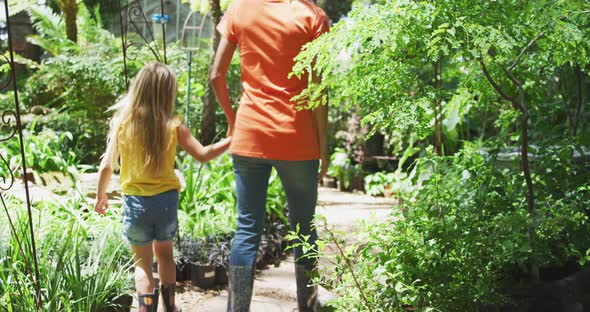 Mother and daughter passing time together in nature alt