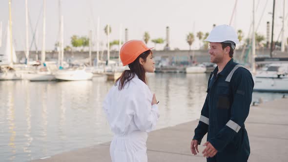 Two Employee Greeting Each Other at Yacht Club alt
