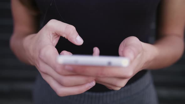 Business Woman Type Message, Using Smartphone on Street, Closeup Shot of Mobile Device in Hands alt