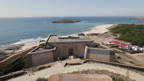 Ancient Fort of Pessegueiro on coastline of Porto Covo, Portugal; aerial
