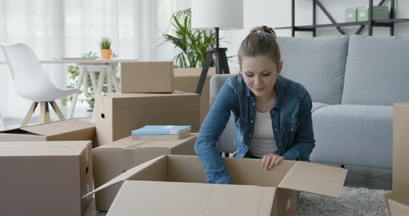 Woman moving in her new home