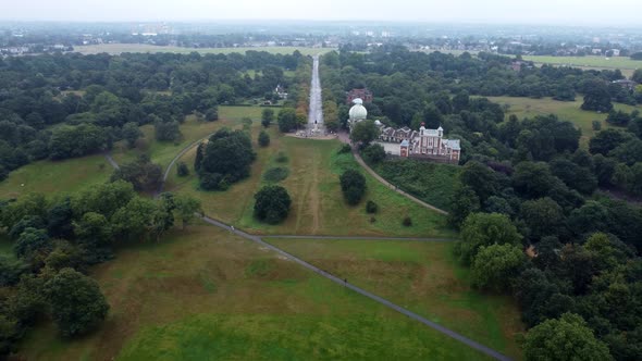 Drone View of a Large Park with a Royal Observatory in the Middle