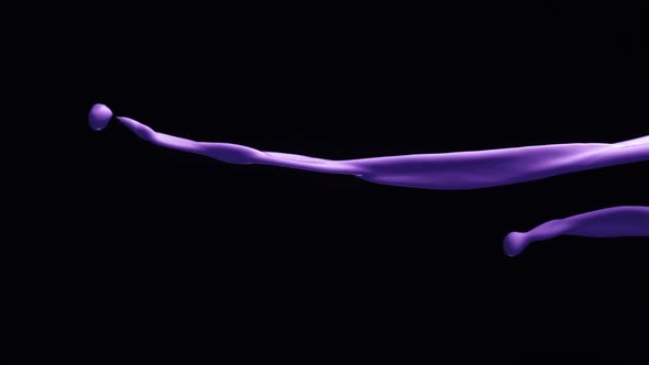 Purple paint pour and splash on black background, Slow Motion alt